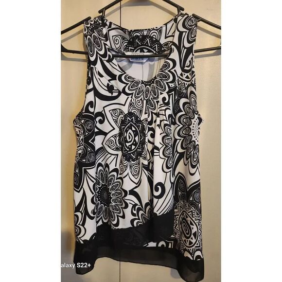KEREN hart Tops - F41 Keren Hart sleeveless flowy blouse
